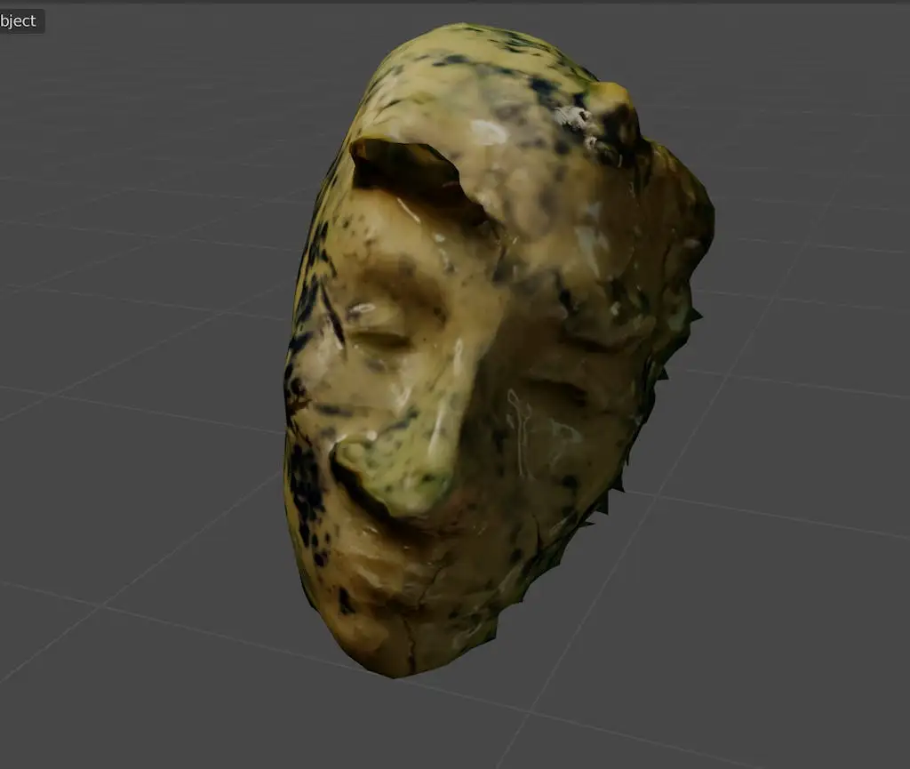 A photogrammetry scan of a Little Martians ceramic face open in a 3D viewport