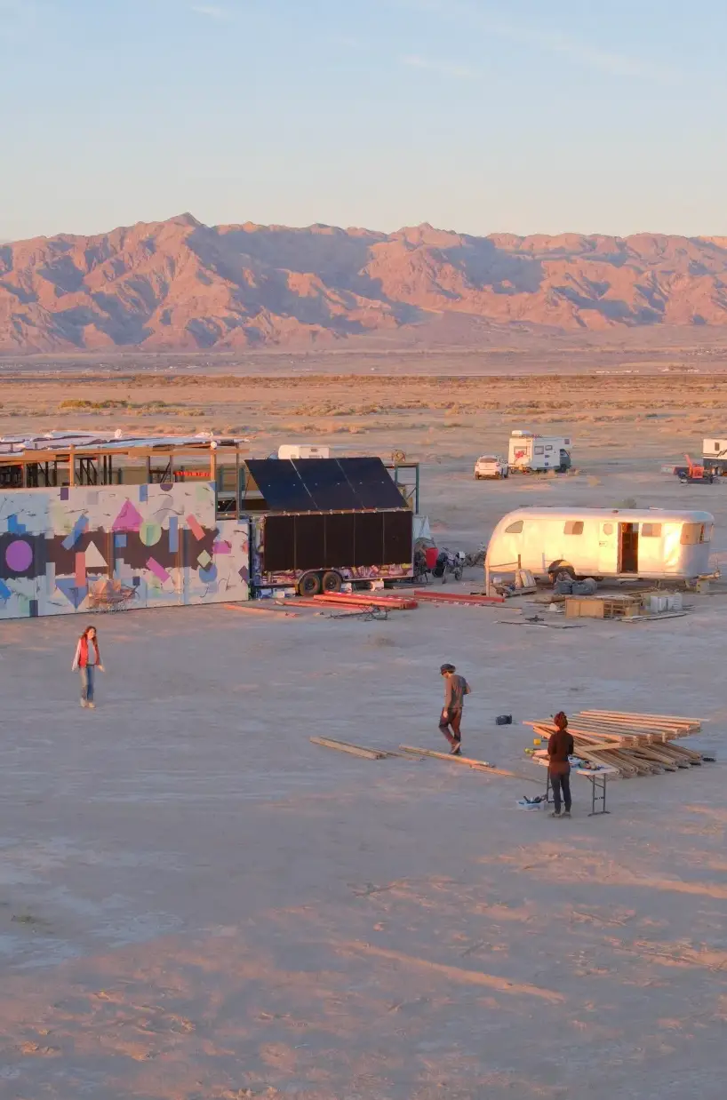 Camp and mountains in the evening light